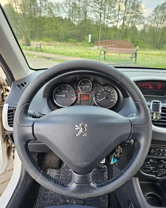 Peugeot 206 plus cena 11900 przebieg: 234857, rok produkcji 2012 z Przysucha małe 211